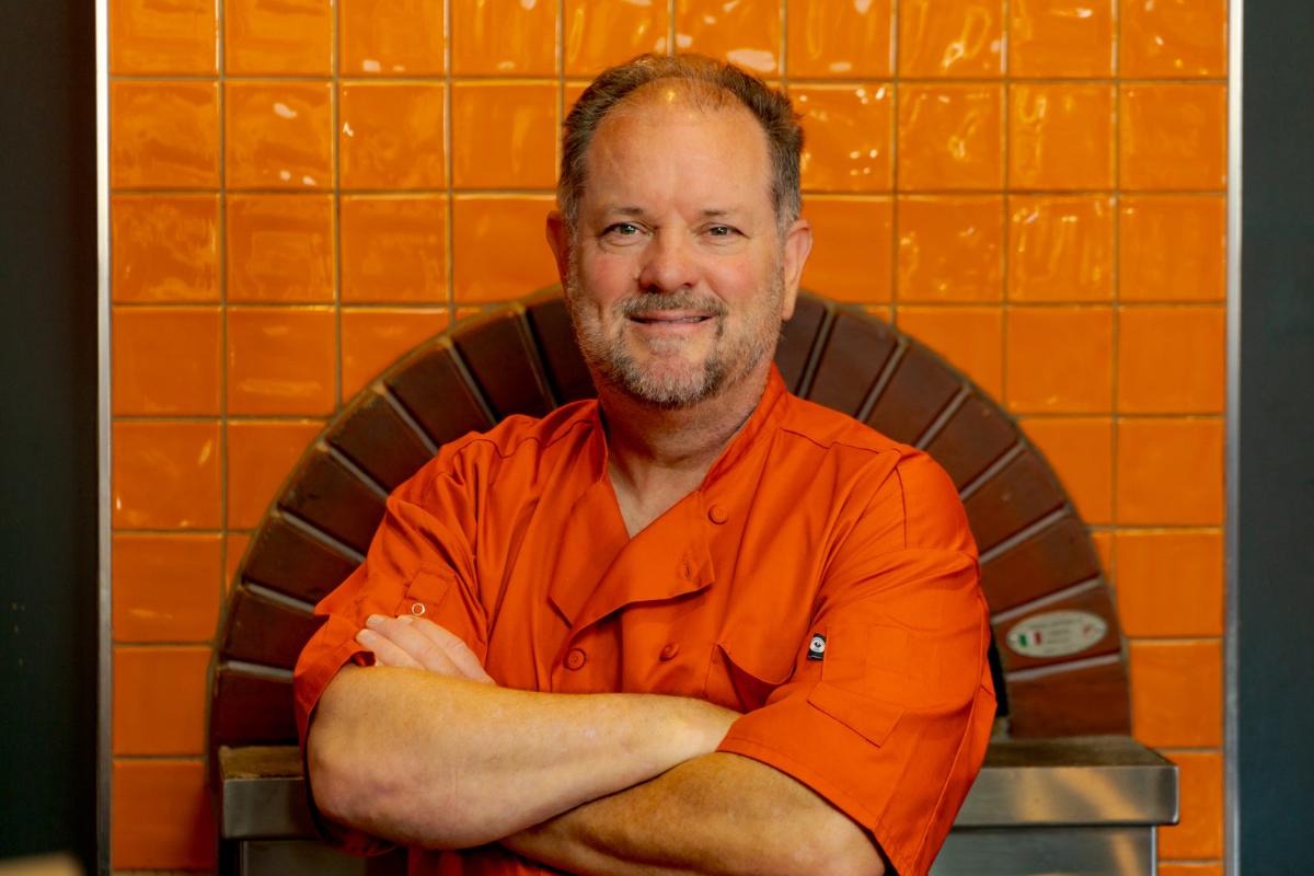 Chef Keith Kuhn at Valeria's wood-fired oven